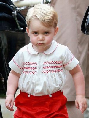 Prince George in his red-and-white tribute outfit at her sister's christening - 2015.jpg